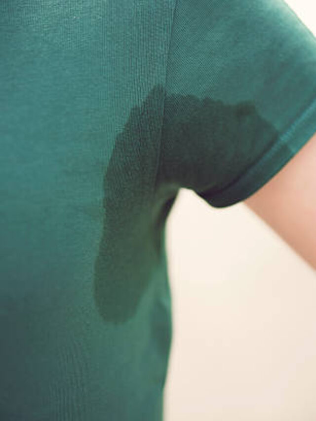 Close up of unrecognizable man's sweaty armpit